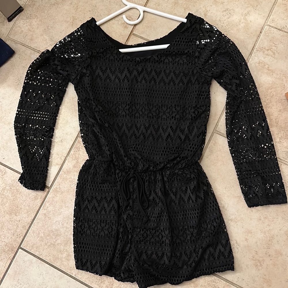 Cheryl creation romper. Size medium.